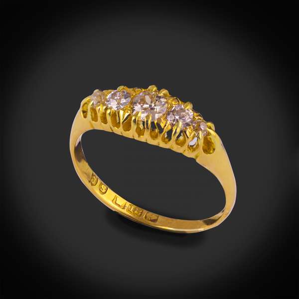 18ct yellow gold five stone diamond ring.