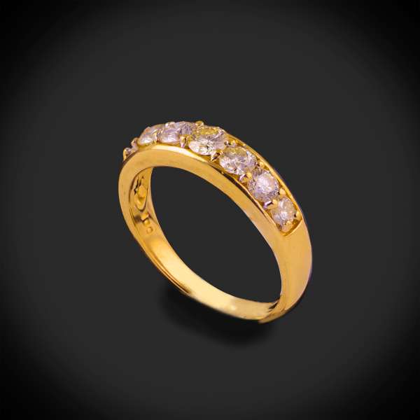 18ct yellow gold seven stone diamond ring.