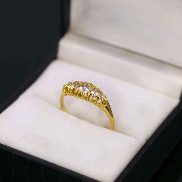 18ct yellow gold five stone diamond ring and box.