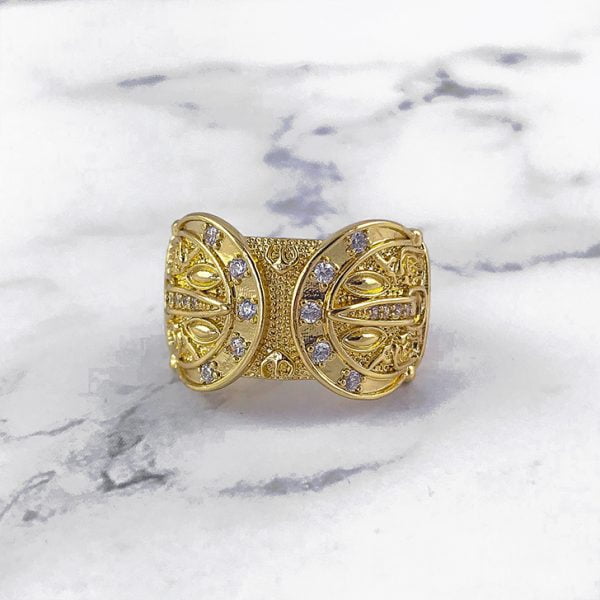 18ct gold bonded stone set buckle ring.