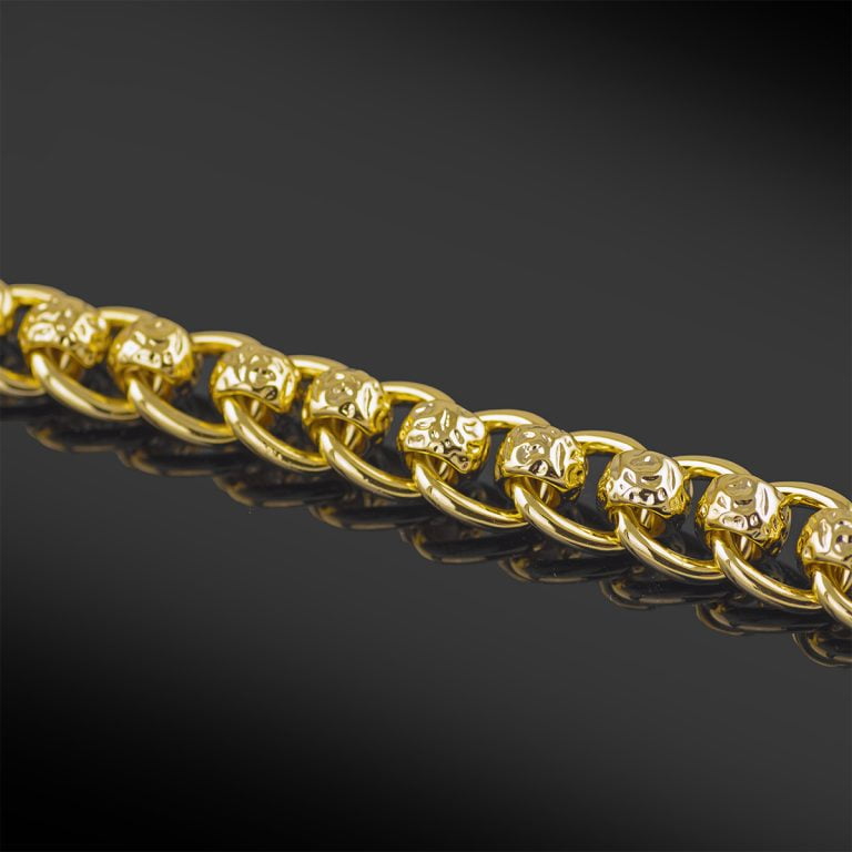 Gold bonded rollerball bracelet.